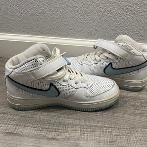 White and blue Nike shoes